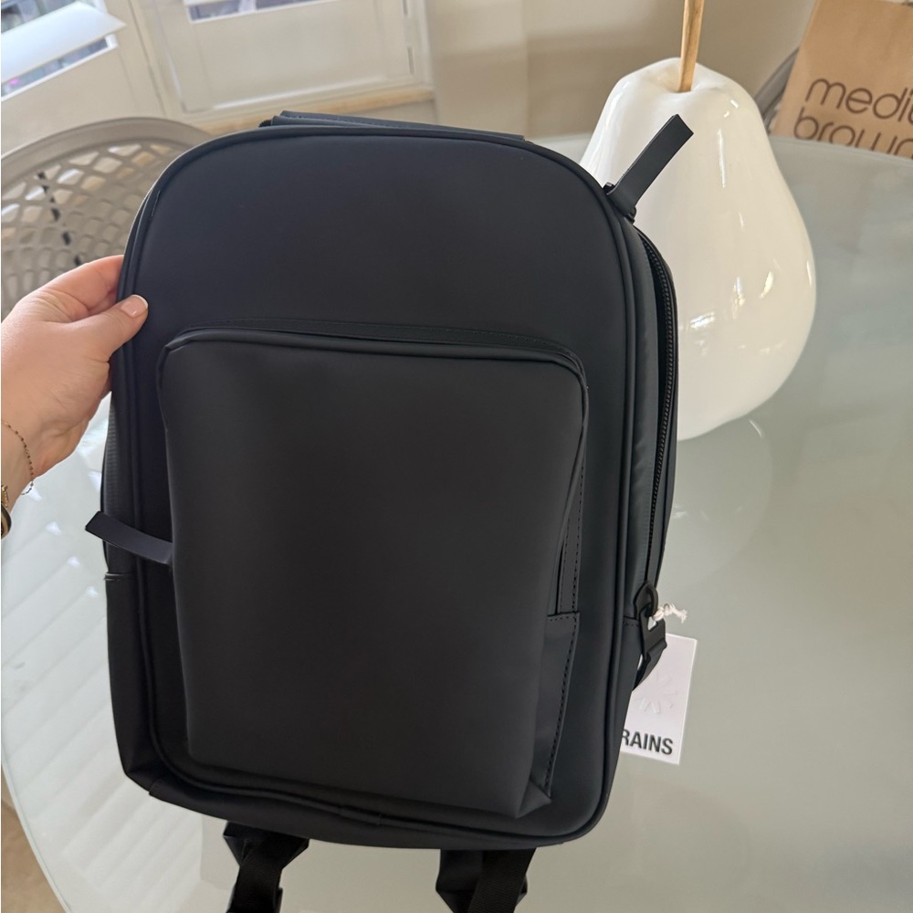 Brand new RAINS backpack with tags!
